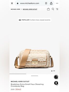 Michael Kors Bradshaw extra-Small crossbody purse faux shearling in peanut color